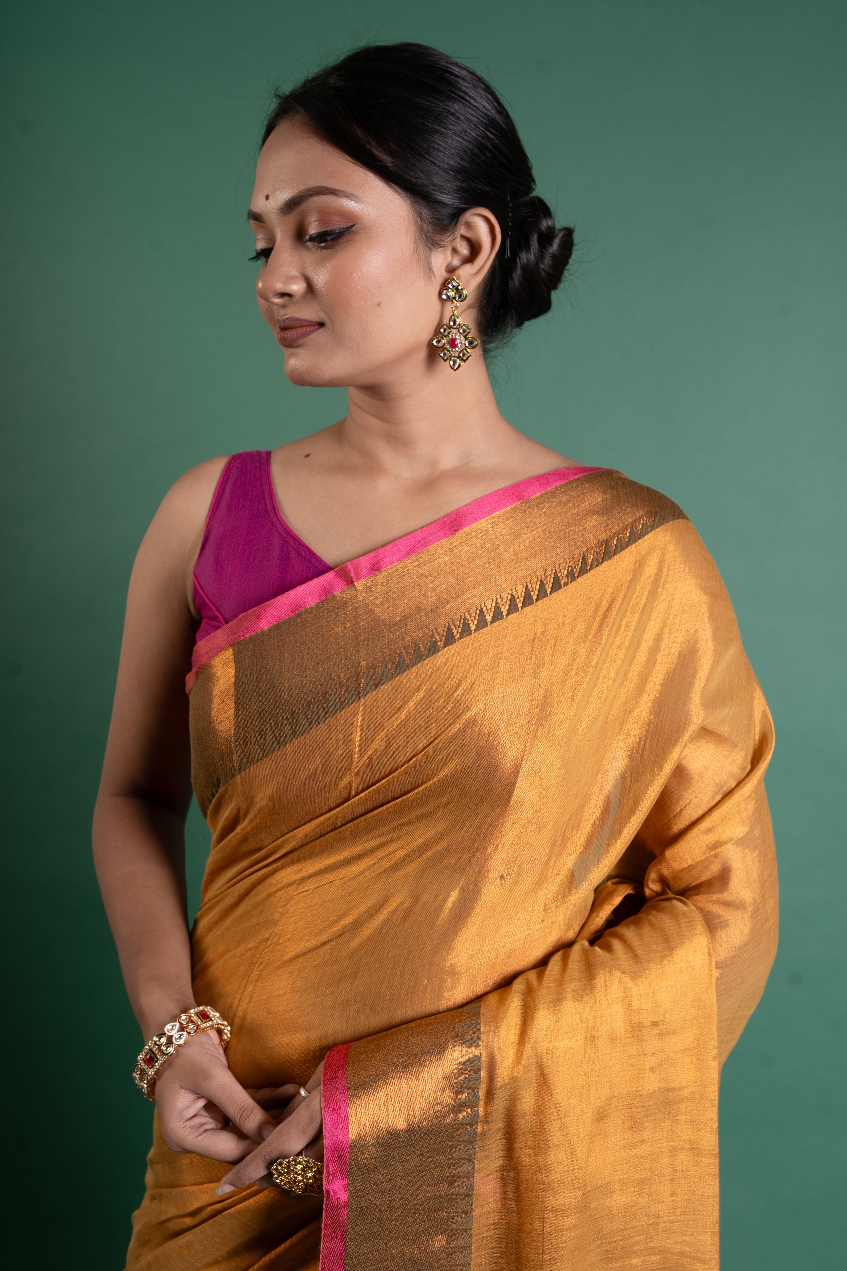 Kanaka Glow Antique Gold Tissue Saree with Zari Border