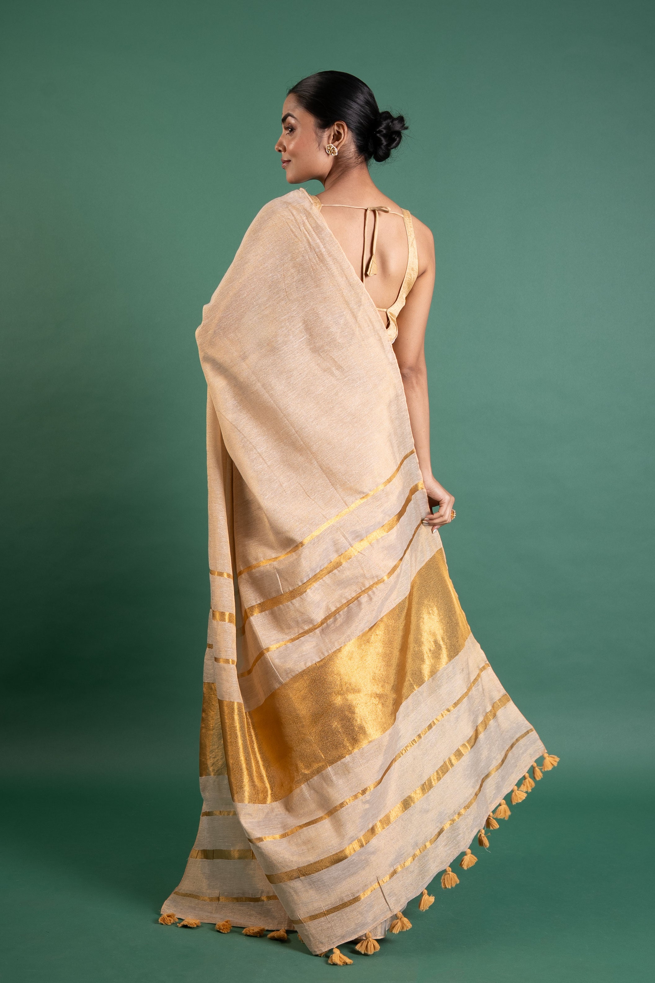Champagne Glow Pure Tissue Saree with Gold Stripe Pallu