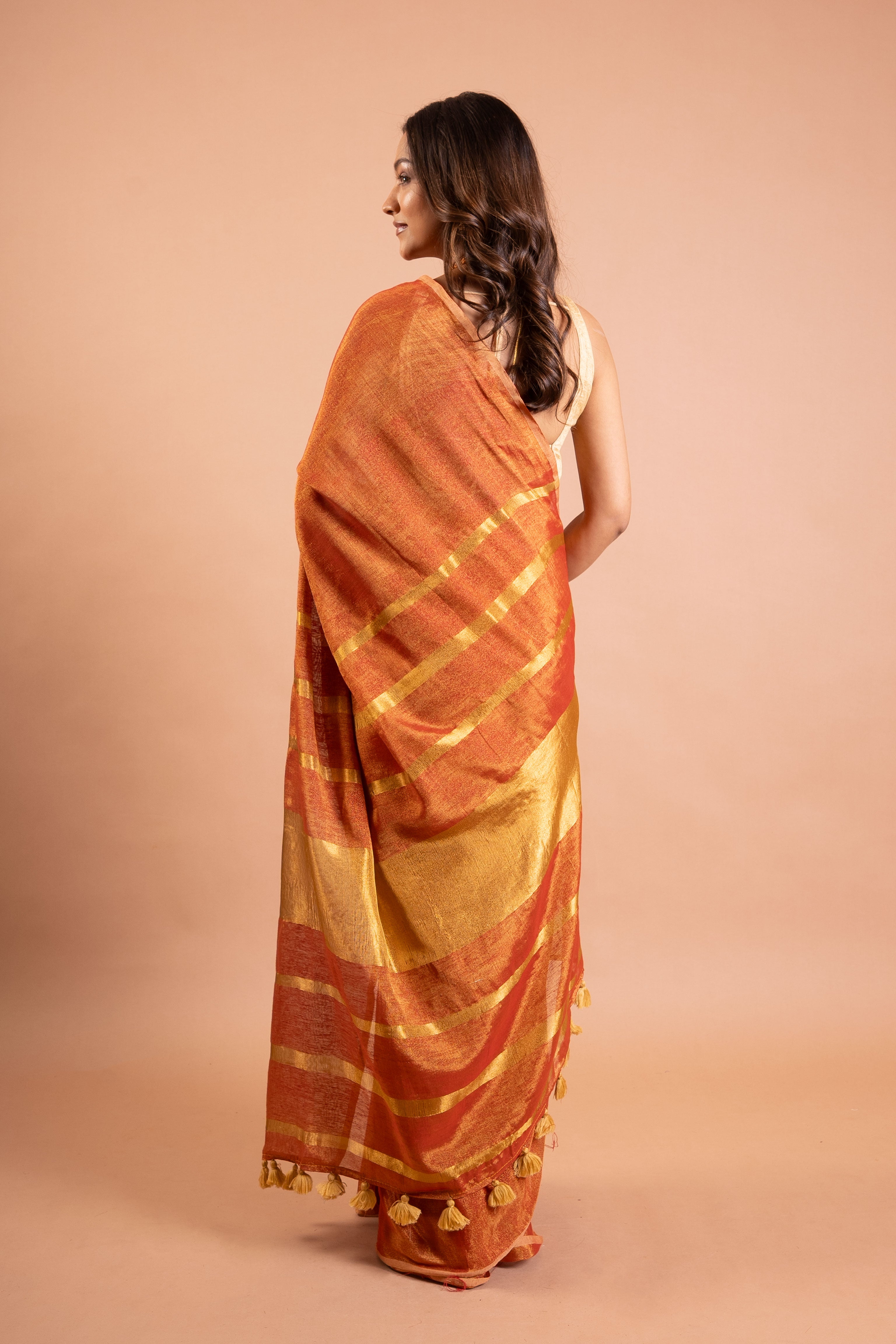 Amber Rust Linen Tissue Saree with Gold Stripe Pallu