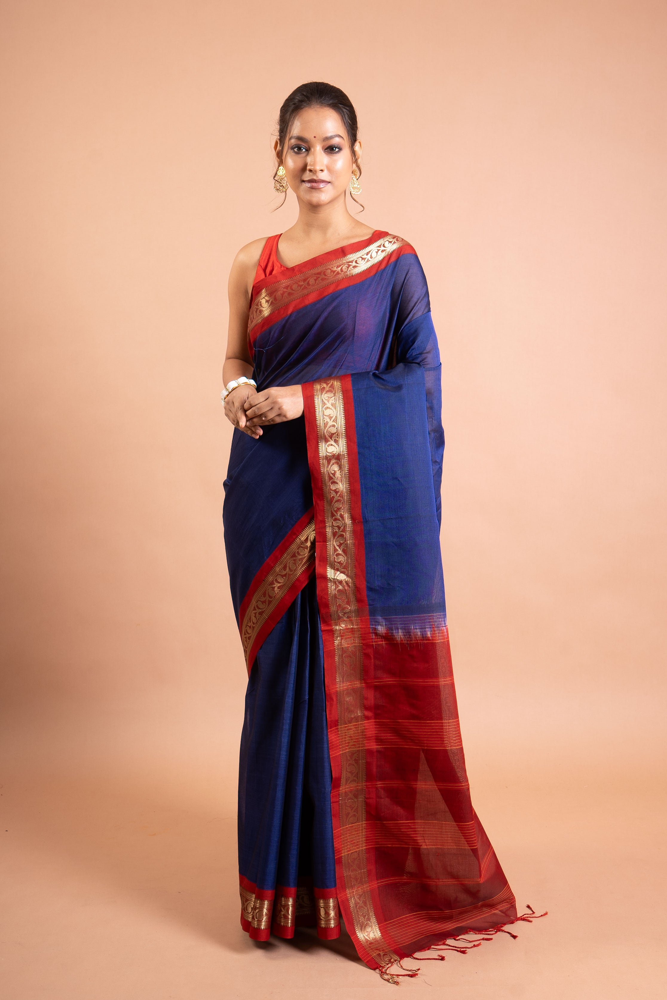 Neelanjali Navy–Red Zari Border Saree